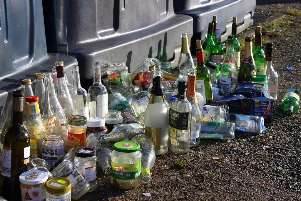 Junk removal: Piles empty glass beer bottles