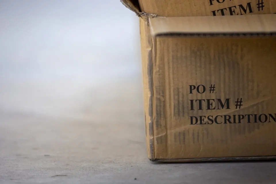 Close-up of a labeled cardboard moving box