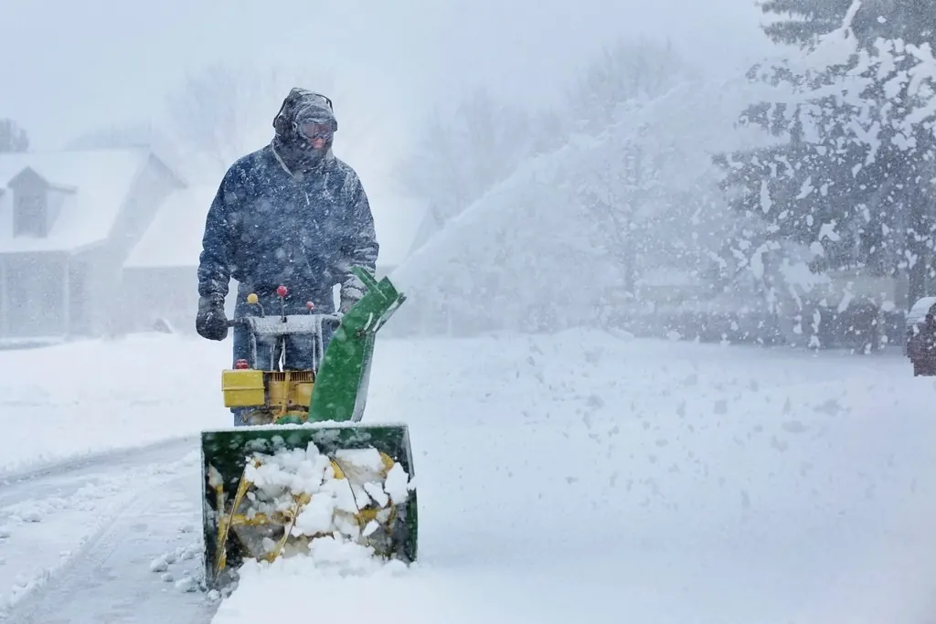 Walkway clearing: Free man shoveling snow machine