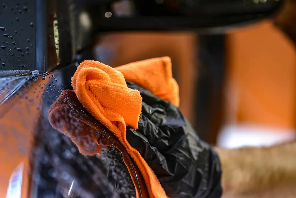 Microfiber towel drying a car interior